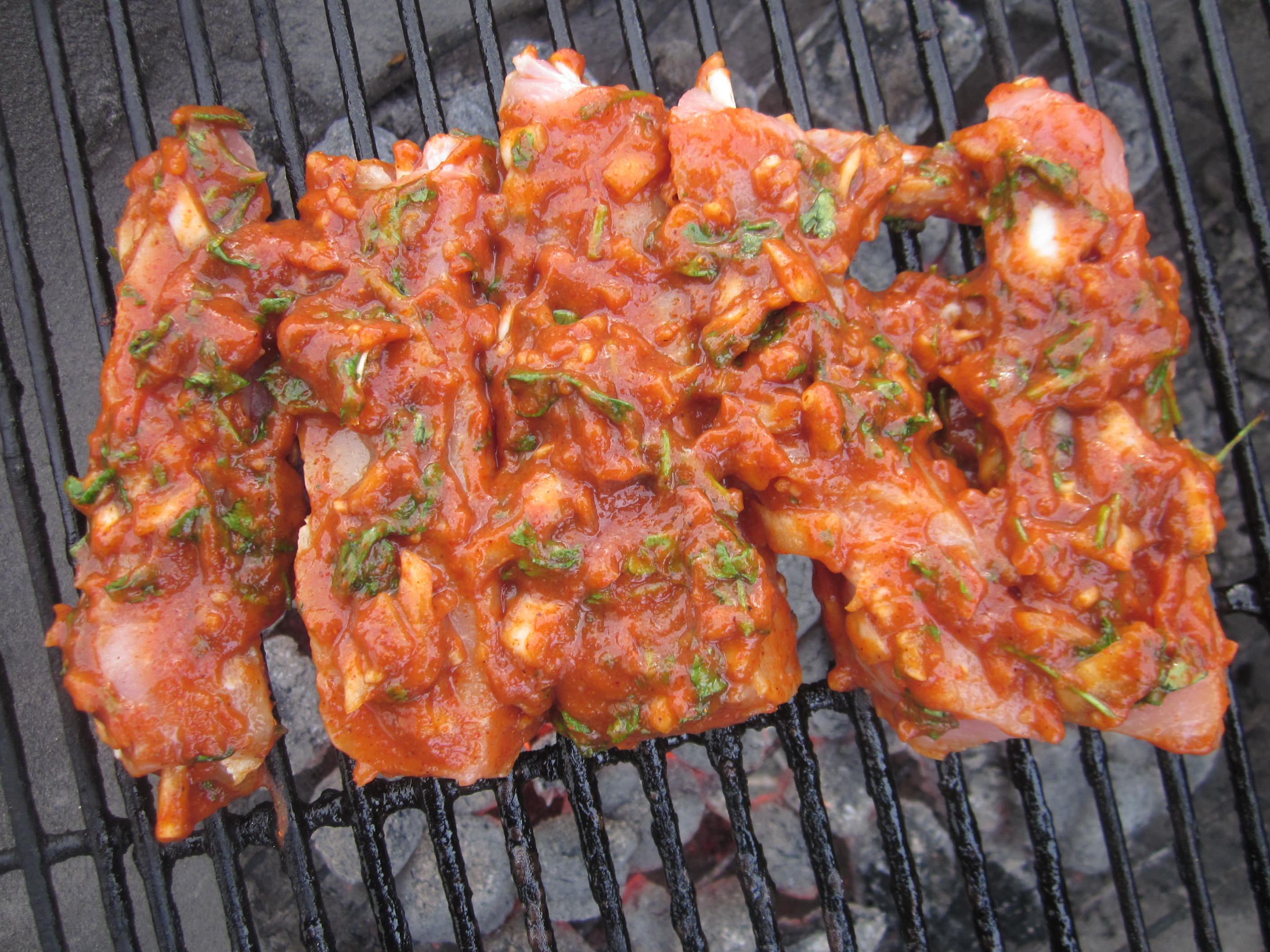 Chili Ribs on a stick on a grill