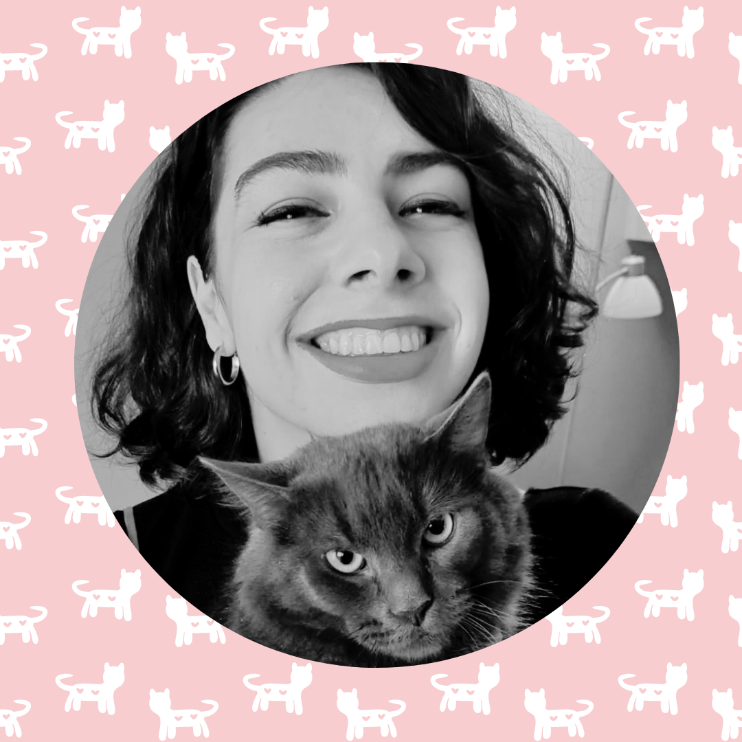 Dark haired women holding a gray cat in a post about eating disorder recovery
