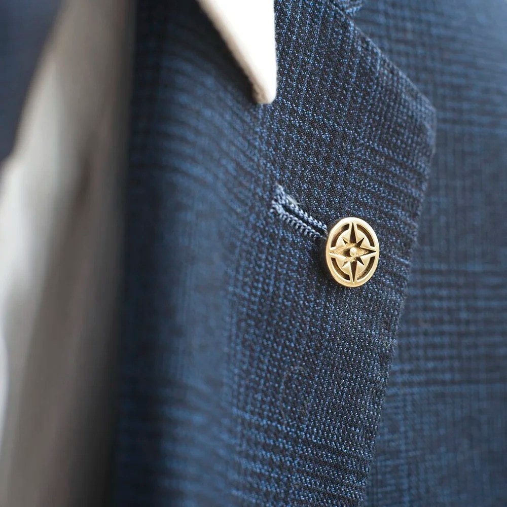 Brass lapel pin - Compass Millet Wade
