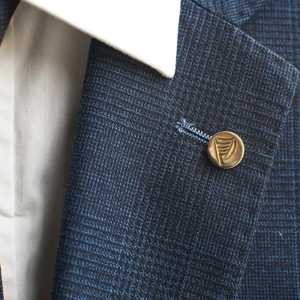 Brass lapel pin - Harp Millet Wade