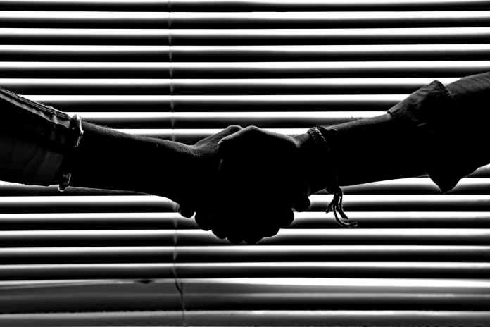 pexels-photo-814544-1 monochrome photography of people shaking hands