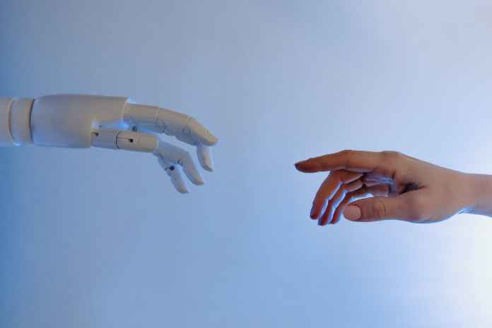 pexels-photo-8386434-1 person reaching out to a robot