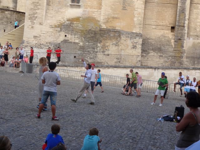 Street performance during the Festival Off in front of the Palais des Papes