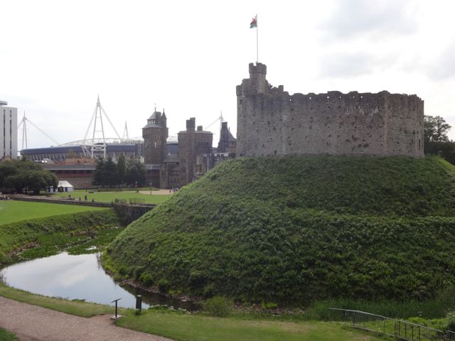 The Norman Keep of the Cardiff Castle with the Millennium Stadium in the background
