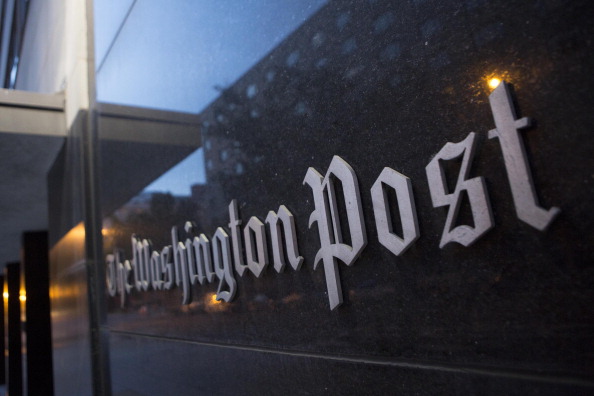 The Washington Post Co. headquarters stands in Washington, D.C., U.S., on Monday, Aug. 5, 2013. Amazon.com Inc. Chief Executive Officer Jeff Bezos agreed to buy the Washington Post for $250 million, betting that he can apply his success in e-commerce to the struggling newspaper industry. Photographer: Andrew Harrer/Bloomberg via Getty Images