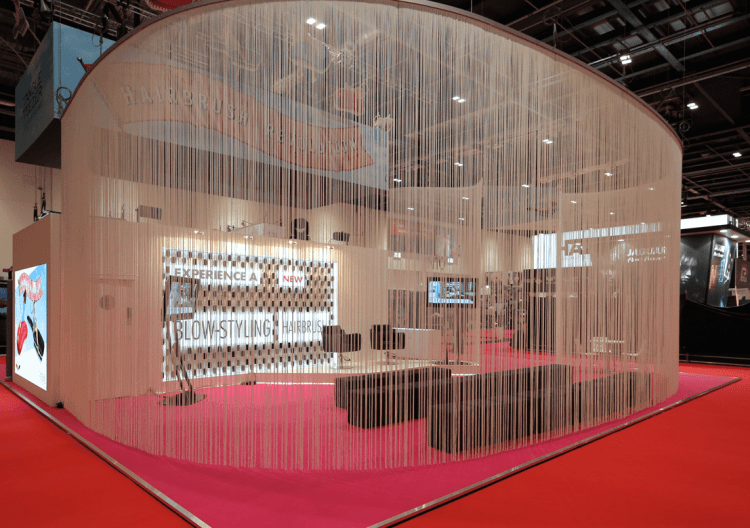 Custom exhibition stand design and build in Riyadh by Cedrus International showcasing modern architecture and branding
