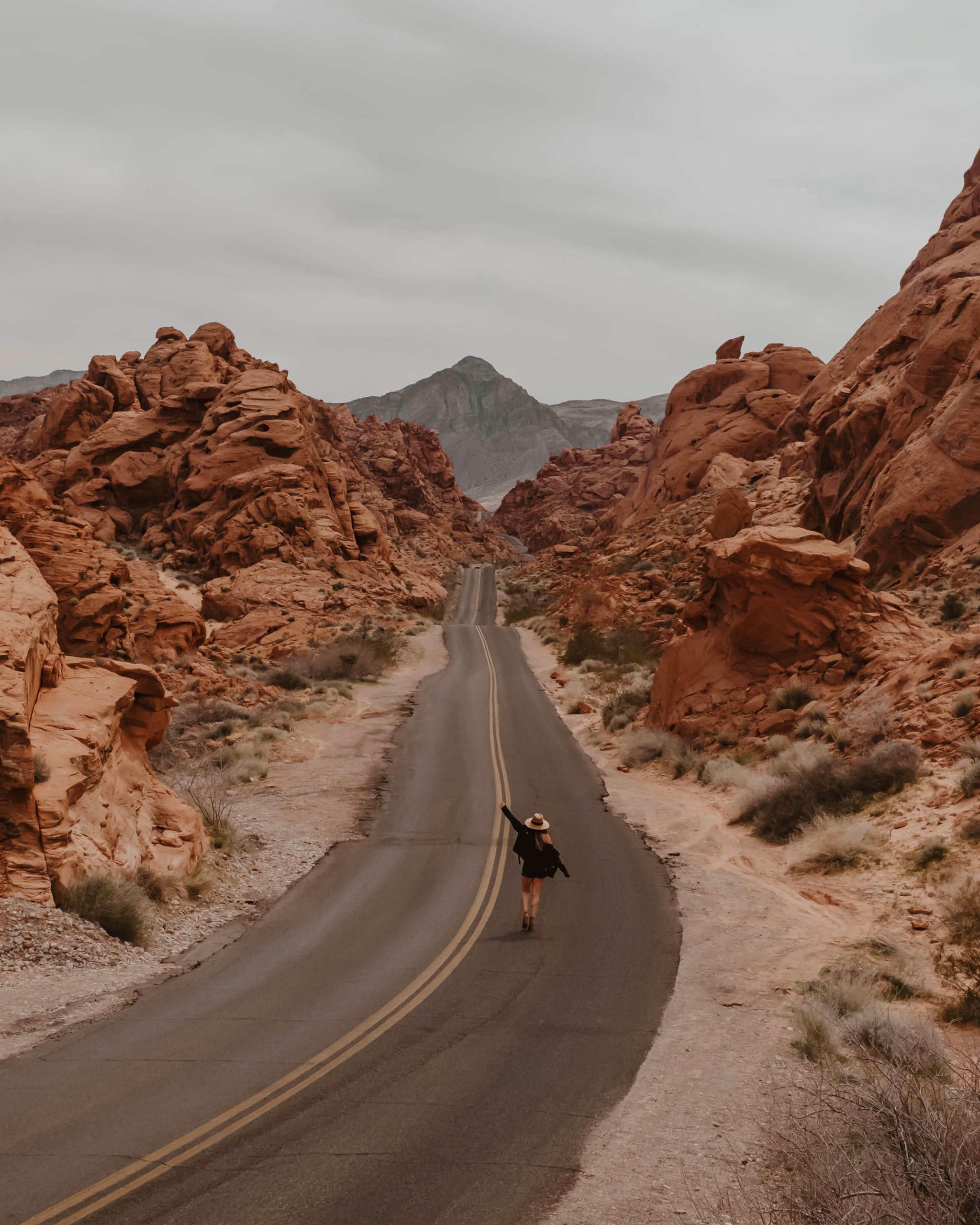 girl in the middle of the road at Valley of Fire, Nevada - Nevada & Arizona road trip guide and itinerary