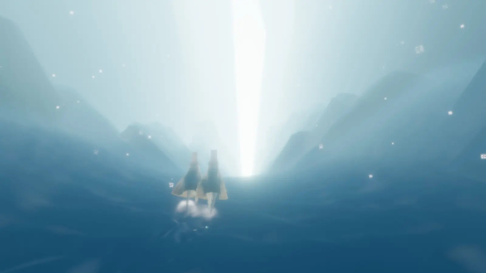 Dos figuras de Journey desplazándose juntas hacia una luz distante.