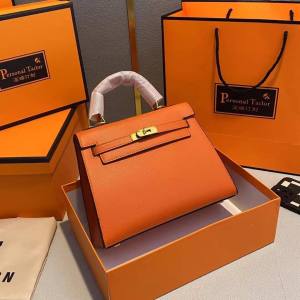 Cisele Orange Small Satchel Handbag with Strap Lock
