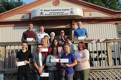 THE ORANGEVILLE ROYAL CANADIAN LEGION dished out 24 bursaries to students pursuing post-secondary education on Tuesday (August 1). Each bursary contained $600.
