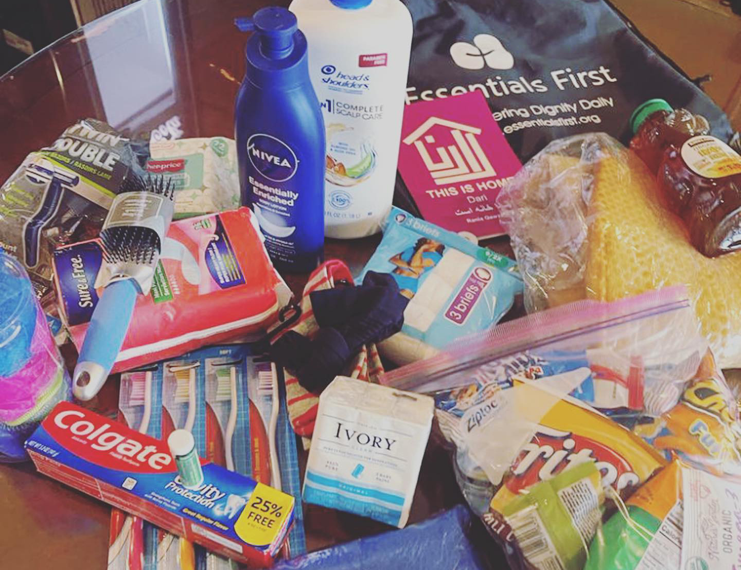 A table with items like toothpaste, toothbrushes, etc