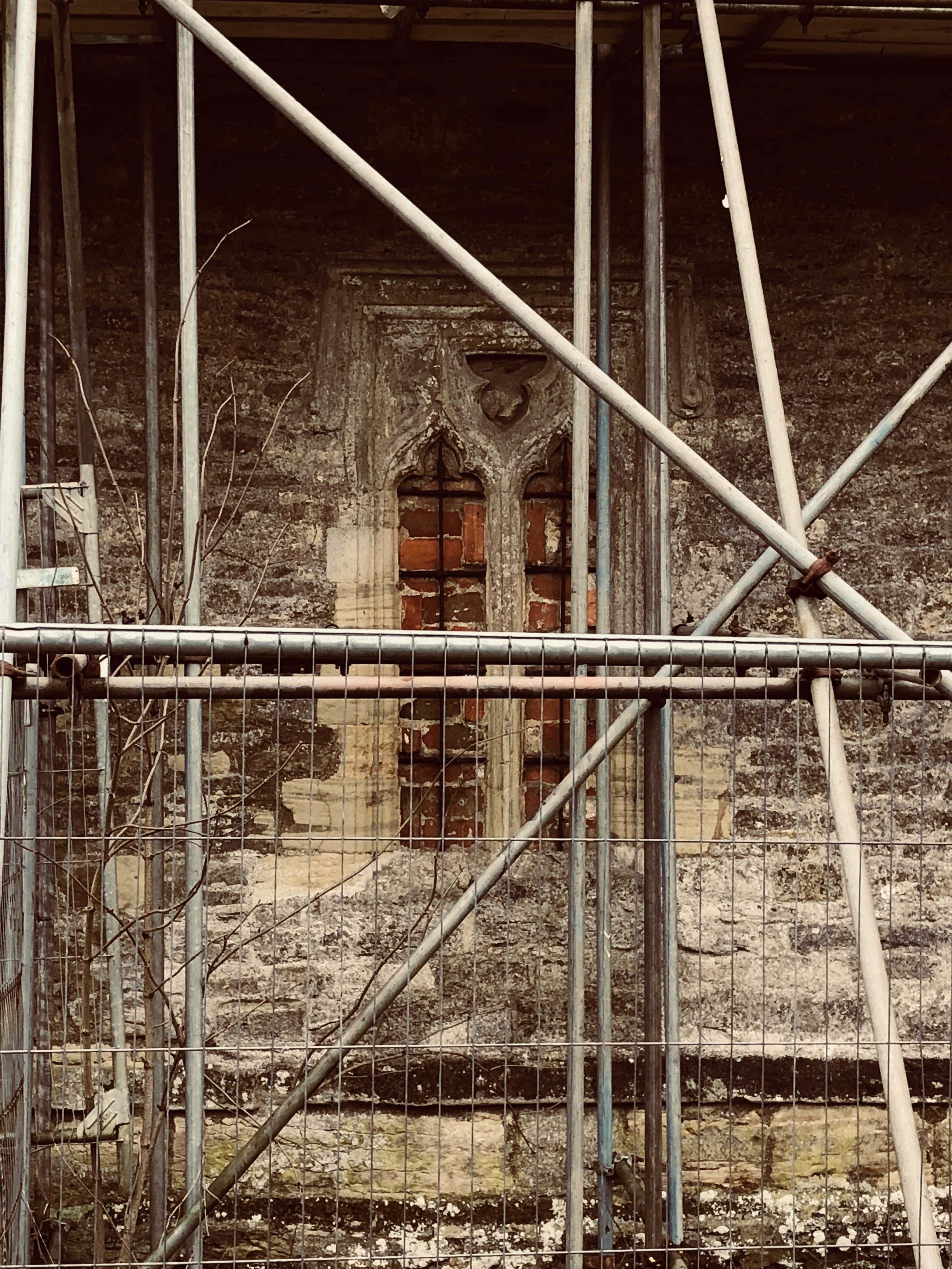 From a distance, this window looked like it was lit insight - it's just the bricks