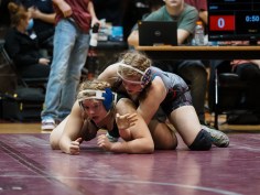 RHS Analise Jetter bottom RHS's Analise Jetter, bottom, during the girls Region 4 wrestling tournament at West Creek High School on Feb. 11, 2022. (Ryan Vinson)