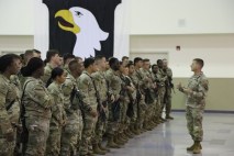 220627-A-WL623-360 Col. John Lubas, deputy commanding officer for operations, 101st Airborne Division, briefs soldiers assigned to 2nd Brigade Combat Team, and 101st Headquarters and Headquarters Battalion on their mission June 27, 2022, at the Passenger Processing Center, Fort Campbell, ahead of their deployment to Europe. (Ethan Steinquest, Fort Campbell Public Affairs Office)