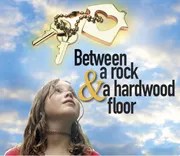 Between a rock a hardwood floor