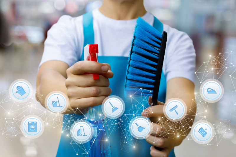 cleaner with spray cleaning fluid and brush in hands, overlaid with icons depicting cleaning tools