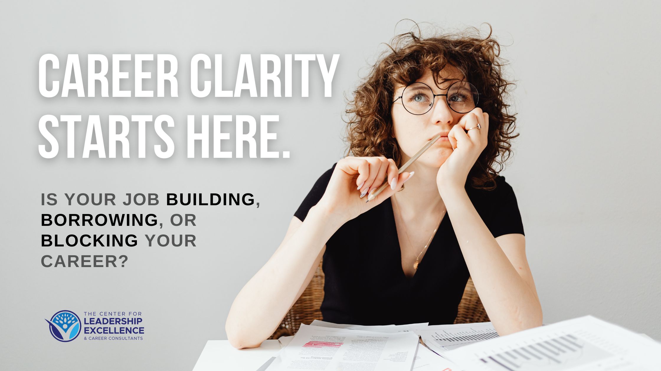 Thoughtful professional woman reflecting on career clarity and whether her current job is building, borrowing from, or blocking her career.
