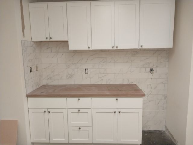 Completed kitchen remodel Albany NY — custom finish by Clifton Development Group