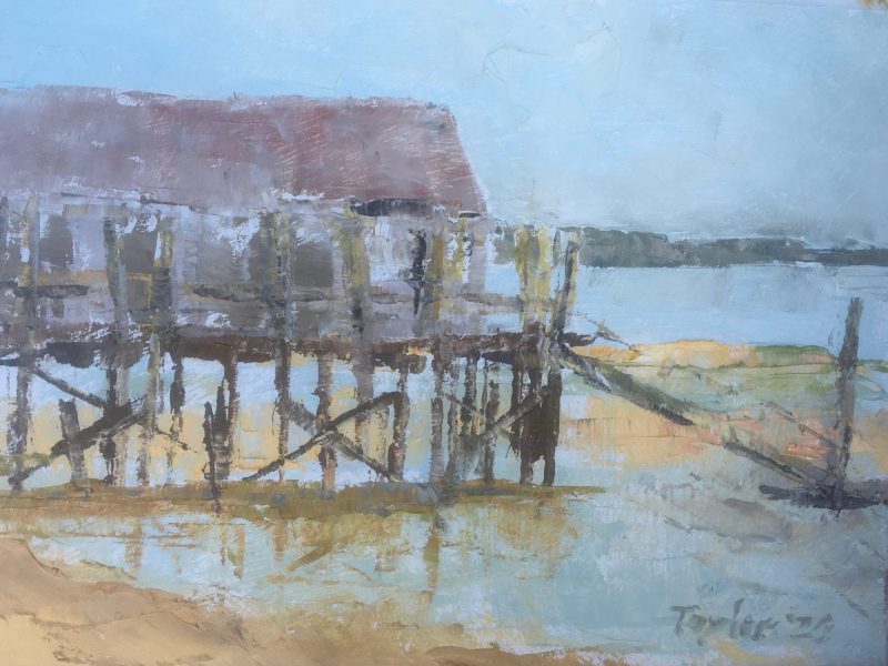 View of Captain Jack's Wharf in Provincetown, MA at low tide