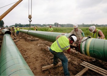 pipeline workers building