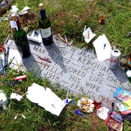 Fans leave tokens at Jack Kerouac’s gravesite in Lowell’s Edson Cemetery.PATRICIA HARRIS FOR THE BOSTON GLOBE/PATRICIA HARRIS