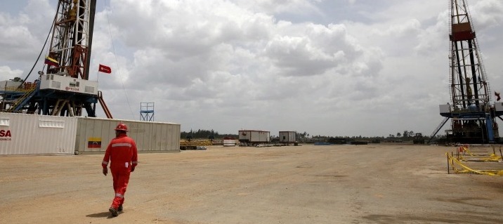 Chevron's four joint ventures with Venezuela's state-owned oil company, PDVSA, produced about 200,000 barrels a day in 2019, but the United States government ordered it in 2020 to wind down production [File: Carlos Garcia Rawlins/Reuters]