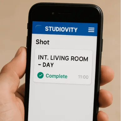 A smartphone showing the Studiovity mobile view with a shot marked as 'Complete' (green checkmark).