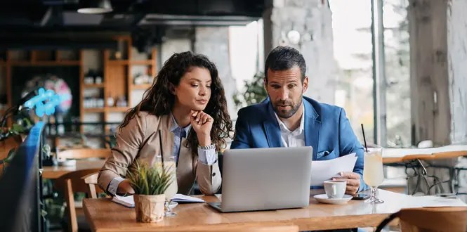 Business team using Cloud Latitude contract management solutions for secure, automated contract workflows