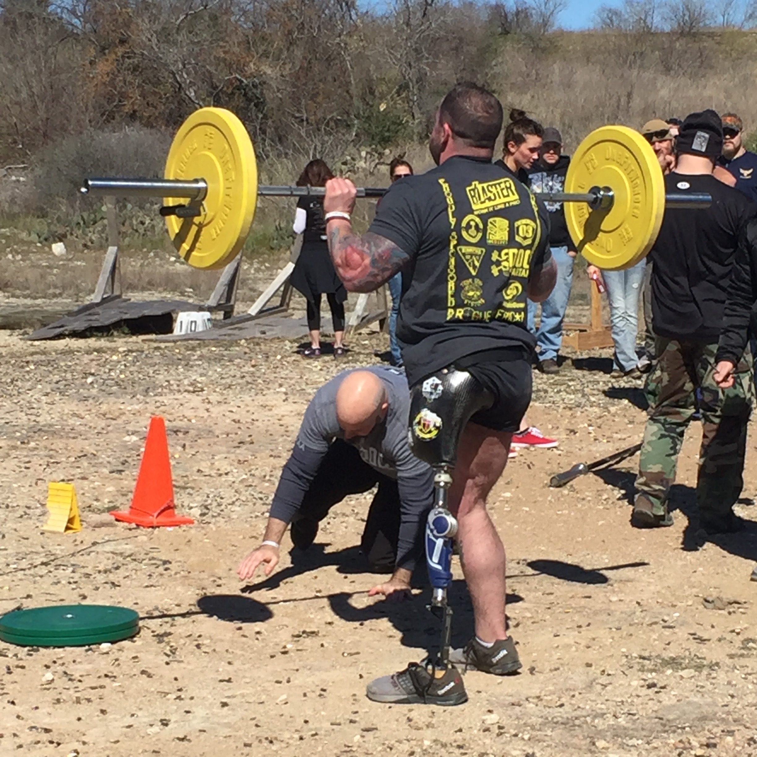 Veterans and team SAR founders Dale King (about to start a push-up) and Derick Carver (lifting).