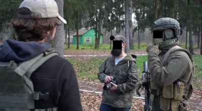 Chris Naganuma interviewing members of Task Force 31, which conducts training of Ukrainian police, border guards, territorial defense and civilian volunteer recruits. 