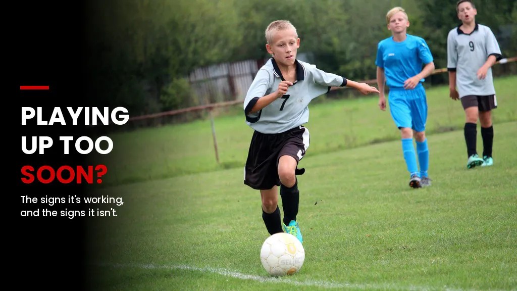 Young player training with an older team after playing up an age group in grassroots football