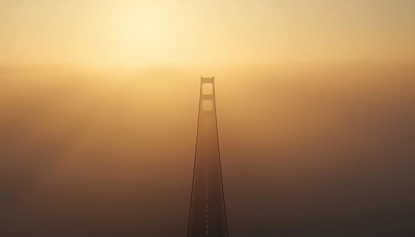 Suspension bridge emerging through fog symbolizing structural authority and clarity in volatile markets
