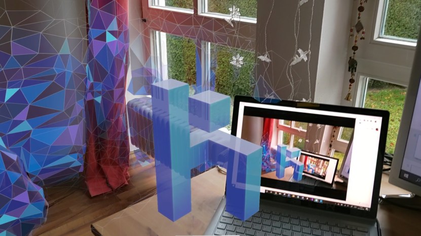  The following image shows my view on the HoloLens 2 and also on my Windows laptop which is connected. Audio from apps is also shared which is really cool when you have to show a live demo.
I'm attaching a video of the whole connecting process below.
<attach video here