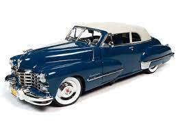 Autoworld  AW274 1/18 1947 Cadillac SRS 62 Soft Top Beldon Blue paint, blue and cream interior, and tan soft top.UP