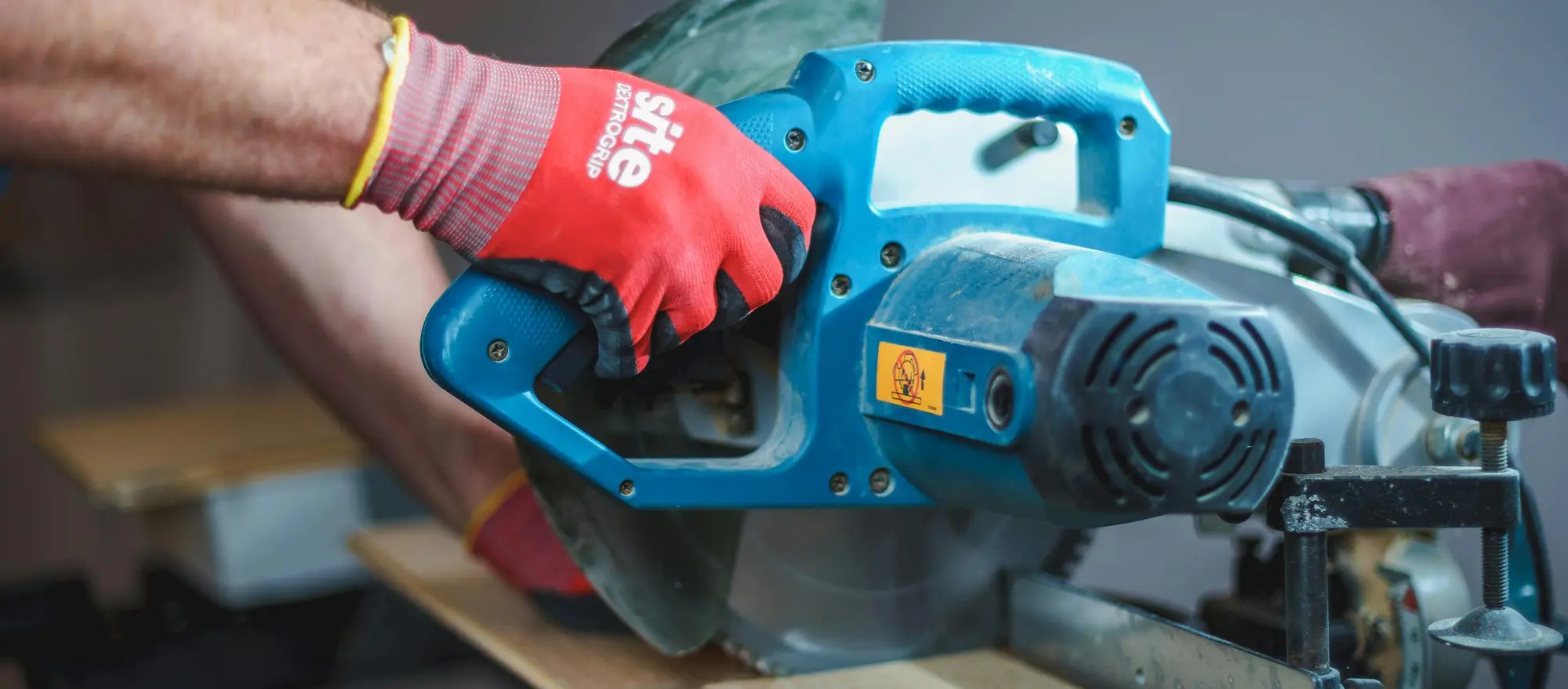 contractor using saw