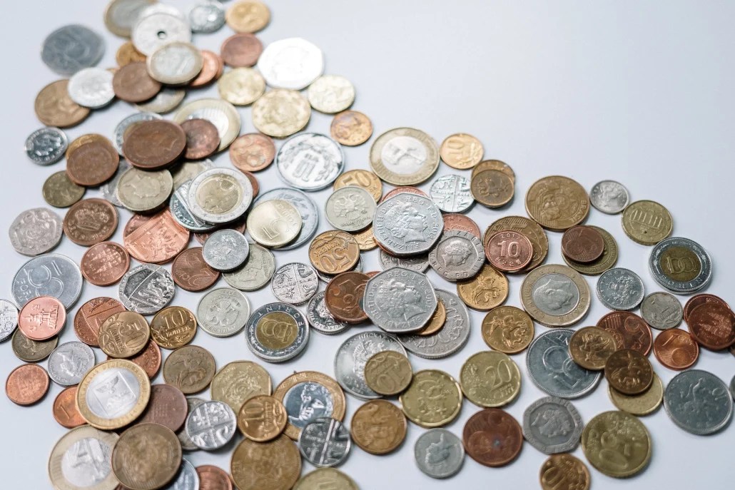 The Evolution of Coins as Commodities