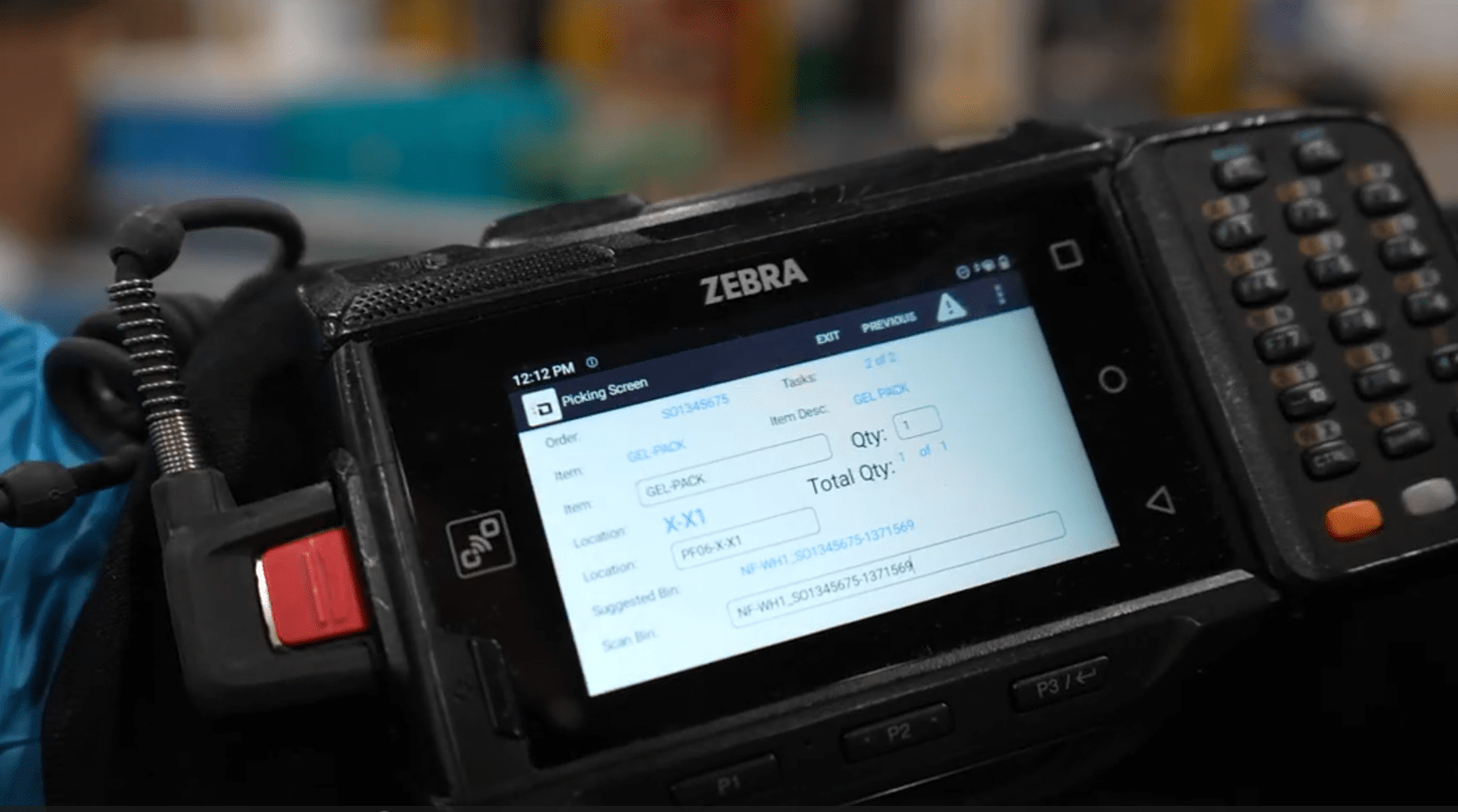 A close-up view of a Zebra-brand wrist computer - part of the warehouse management system ColdTrack uses to pick 10s of thousands of items each day