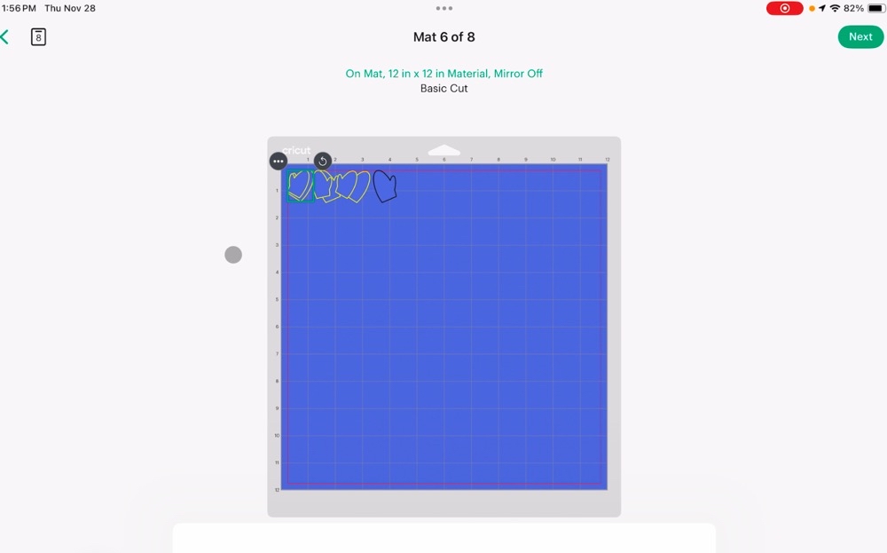 Screenshot from Design Space showing all of the mittens moved to one mat before re-arranging them to fit the card on the cutting mat for today's Easy Christmas Tags with Cricut post.