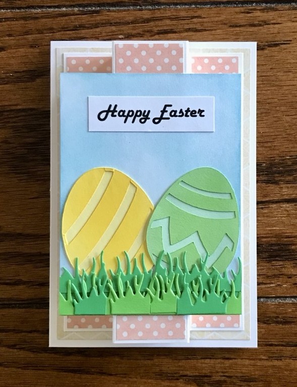 Photo of another way to use the pop-up feature of today's card featuring Easter egg SVGs and an ink blended sky background with grass cut from a This Calls for Confetti die set.