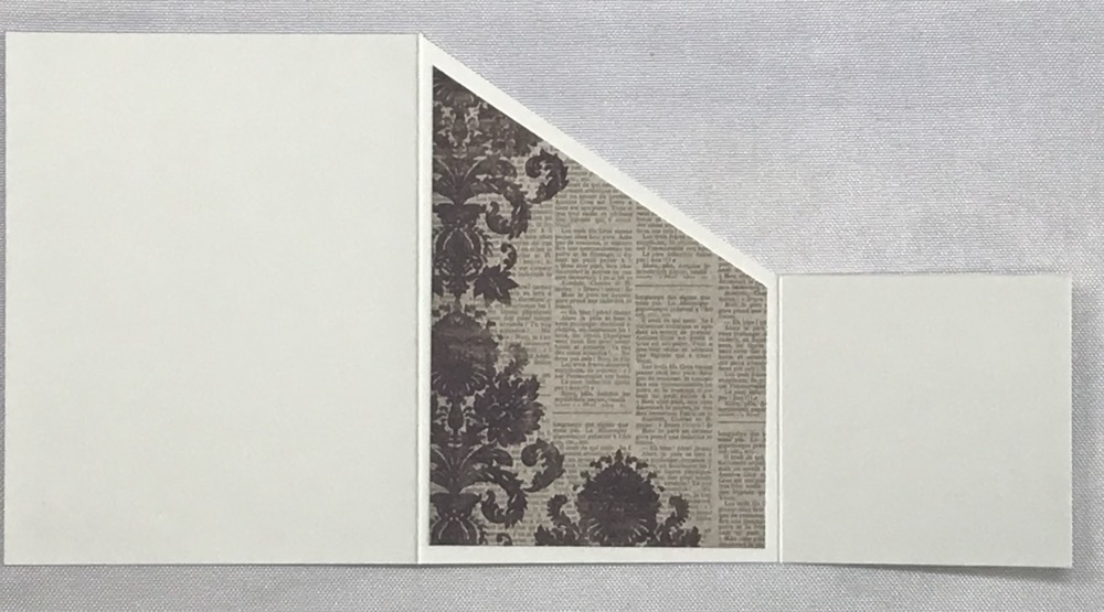 Photo showing the center panel adhered to the back of the card before folding the Zig Zag Card.