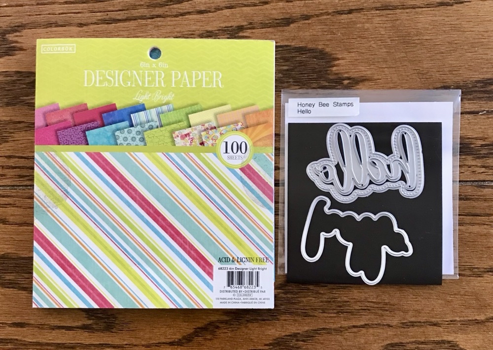 Photo of the Honey Bee Stamps Hello stamp and die set and Light Bright paper pad from Colorbok used in this insiration card.