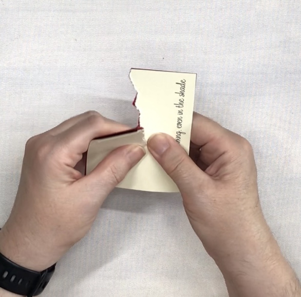 Photo showing how to rip the top two cardstock layers for today's Create a Beautiful Fault Line Card post