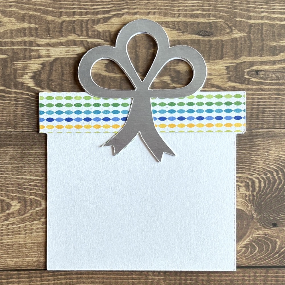 Photo of another finished gift card featuring Recollections card stock, Silver mirror cardstock and pattern paper from a Simon Says Stamp sample pack.