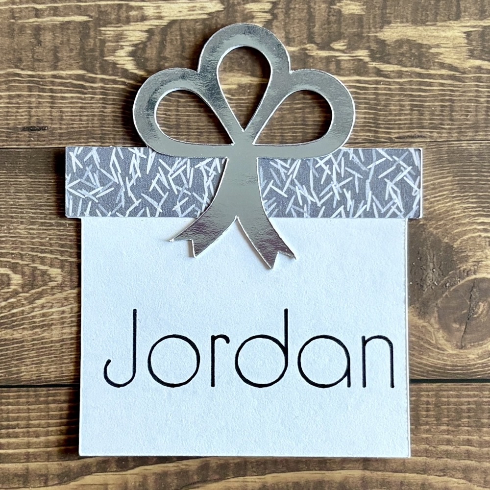 Photo of the finished gift card made for today's Layered Gift Tags with Cricut post featuring patter paper from Die Cuts With a View, Mirror silver cardstock and Recollections cardstock personalized with the 0.4 Fine Tip Cricut pen.
