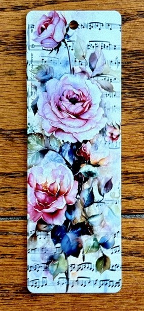 Photo of my Classic Fail of the Day with the same image sublimated on the SAME side of the bookmark.
