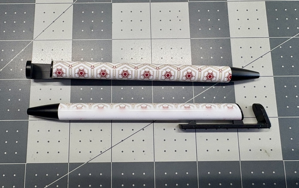 Photo of the finished pens created in today's Testing the Limits of the HTVRont Phone Case Heat Press post.