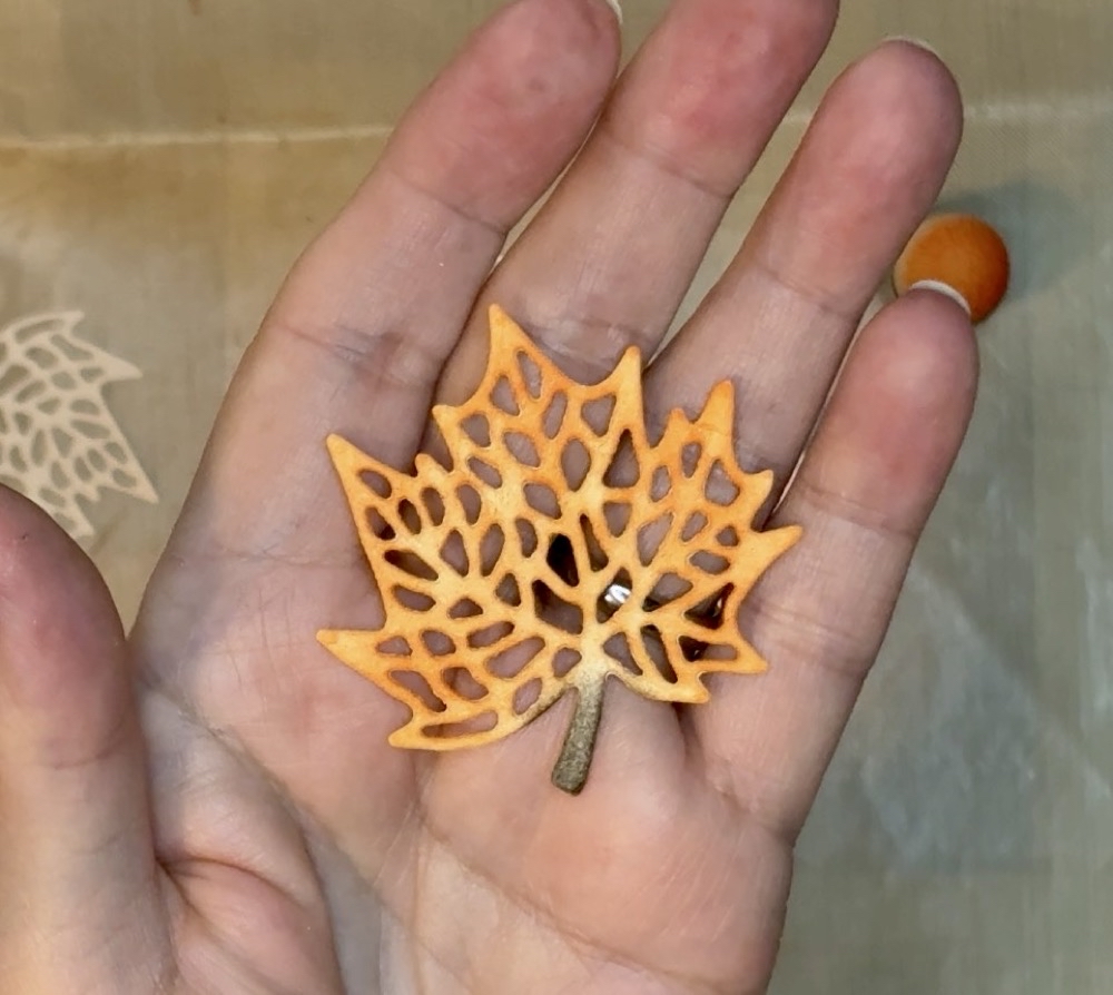 Photo of the first of three inked maple leaf die cuts used on the second card for today’s Easy Acrylic Block Watercolor Backgrounds post.