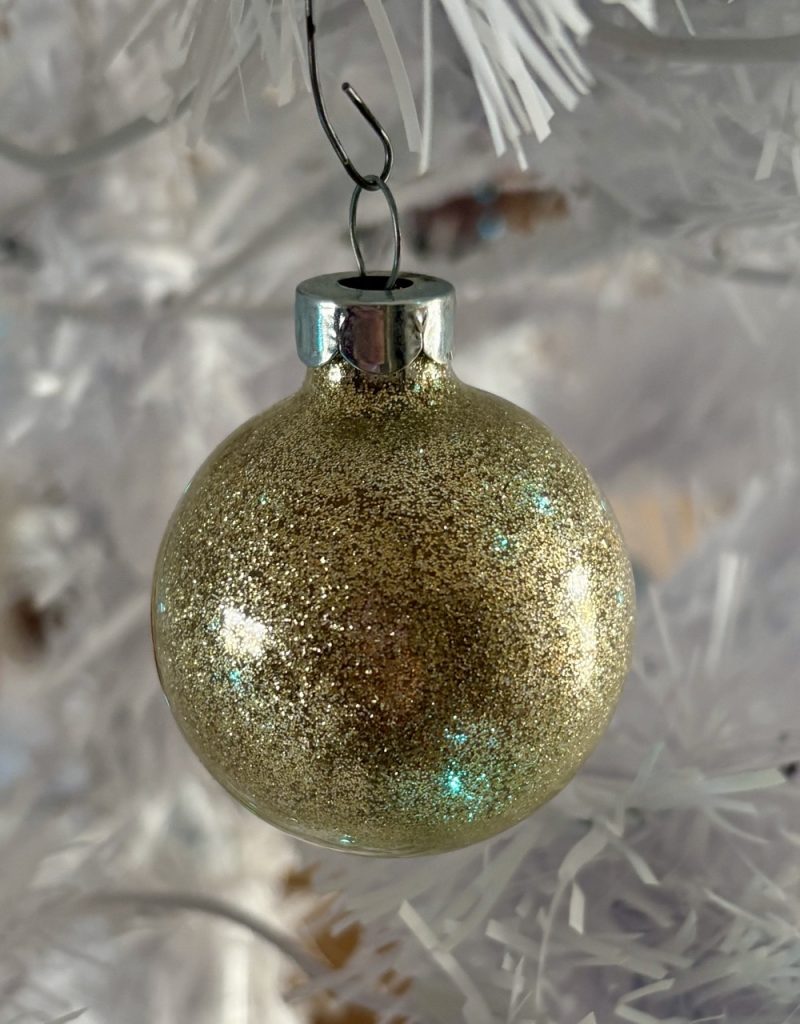 Current photo of glitter ornaments for today's Flashback Friday Three Years Later post featuring gold colored glitter.