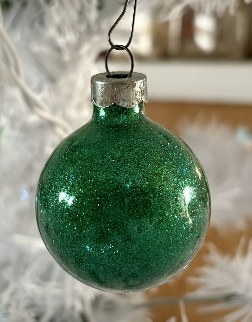 Current photo of glitter ornaments for today's Flashback Friday post featuring green glitter.