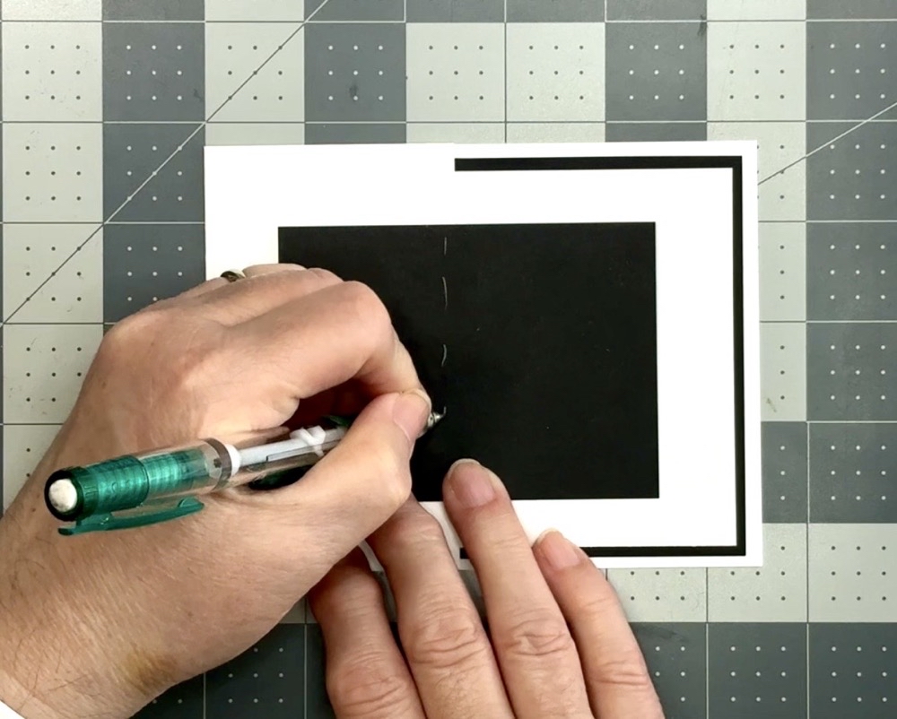 Photo showing how I mark the back of panels that only need a bit of adhesive.